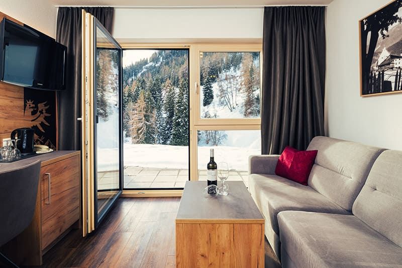 Suite with terrace overlooking the snowy landscape