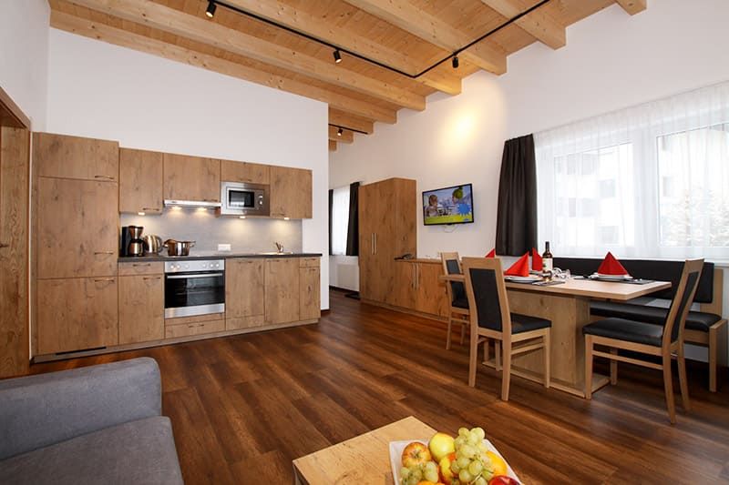 Ferienwohung mit Wohnbereich und Küche im Hotel Bärolina