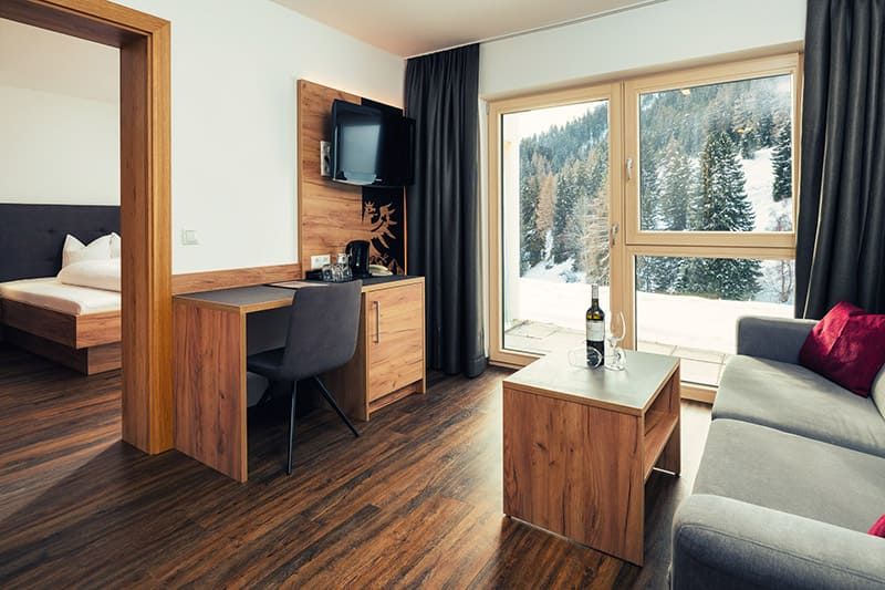 Apartment with bedroom and living room in the hotel Bärolina Serfaus